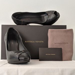 Black peep toe pumps